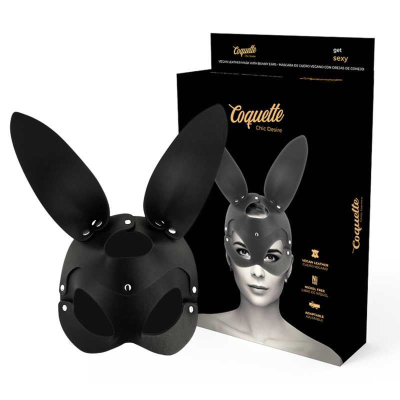 Ledermaske mit Hasenohren und Nieten, schwarz, zusammen mit schwarzer Produktverpackung mit goldenem Schriftzug